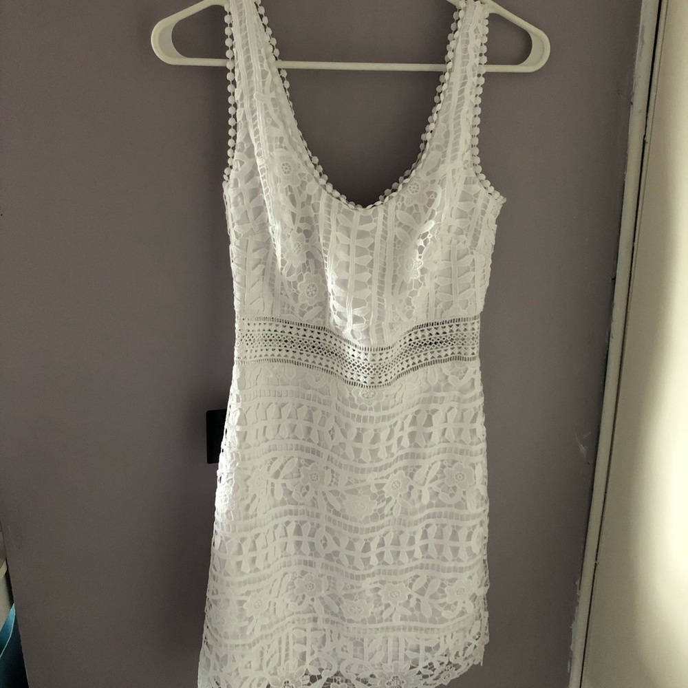 Brand new never worn Bebe dress size 4. No stains.